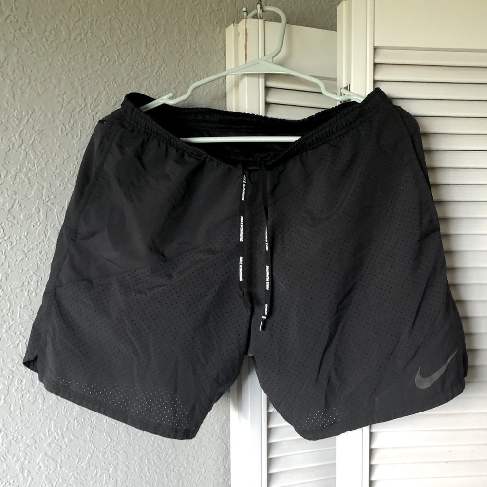 Nike running Men’s shorts 7”. M